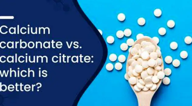 A smaller calcium carbonate pill next to a larger calcium citrate pill on a neutral surface.