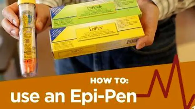 Used EpiPen auto-injector placed inside a small plastic sharps container