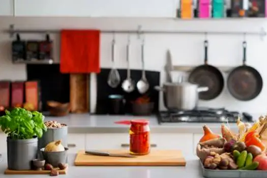 Colorful vegetables, grains, and fruit on a kitchen counter