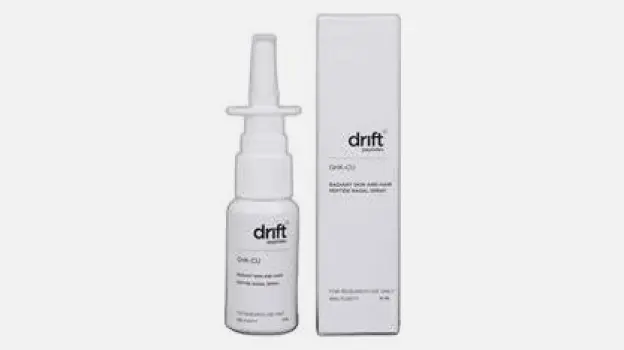Illustration of a nasal spray bottle releasing droplets into a nasal passage