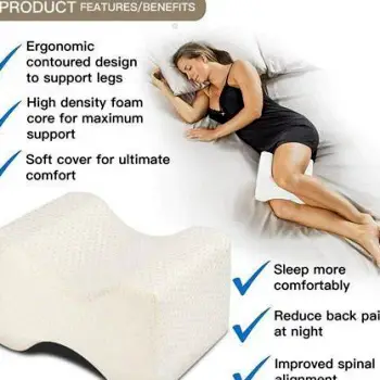 Side-lying individual with a pillow placed between knees to support spinal alignment
