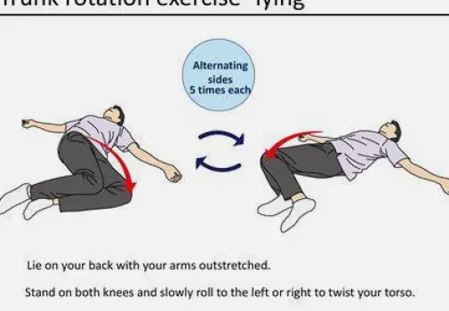 Person standing in a living room performing a slow trunk rotation exercise to mobilize the back