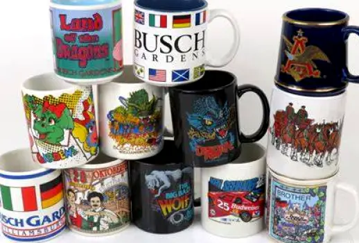 Twelve standard 8 fl oz coffee mugs stacked vertically, each filled to show 8 fl oz capacity