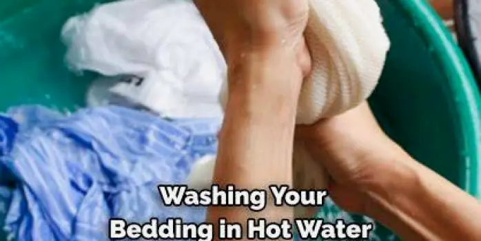 Hands washing bedding in hot water, representing dust mite cleaning practice